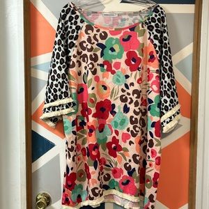 Women’s floral and cheetah print blouse